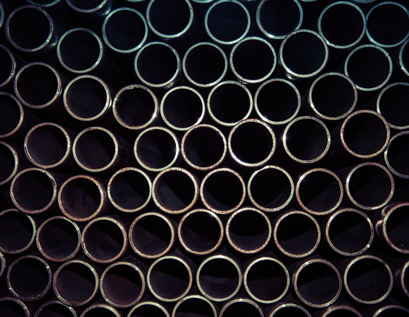 Large canva   close up photo of gray metal pipes