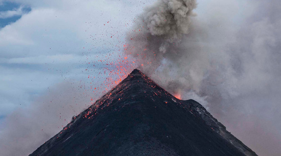 Homepage canva   eruption of volcano during dawn